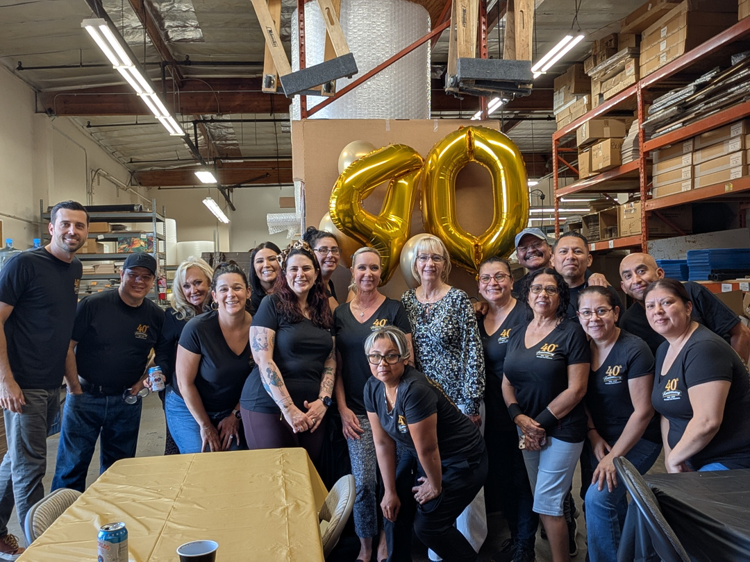 Picture This Framing team celebrating 40 years